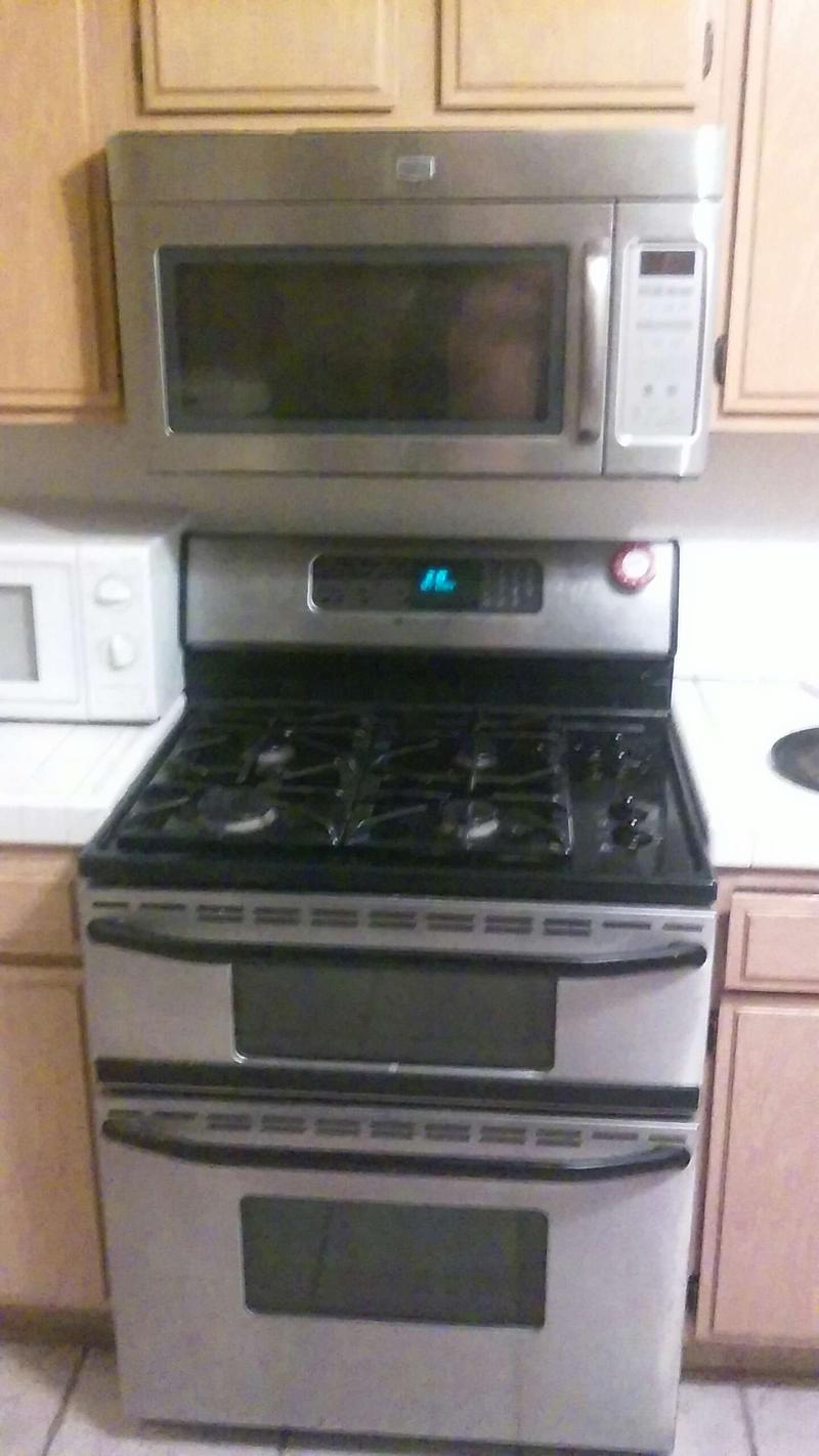 Maytag stainless steel gas stove and microwave combo state sale at 8349