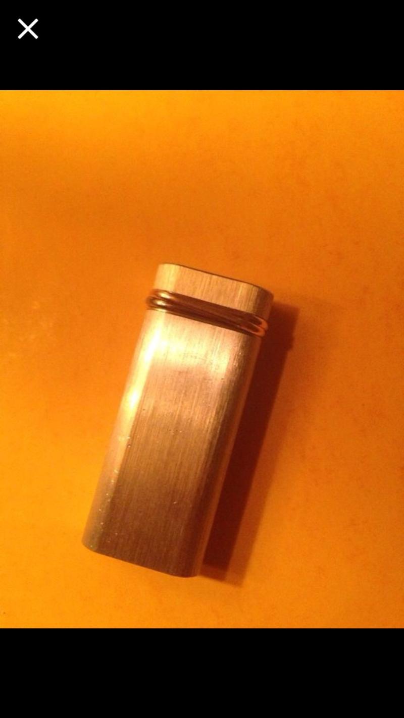 Authentic vintage Cartier lighter. Gold 