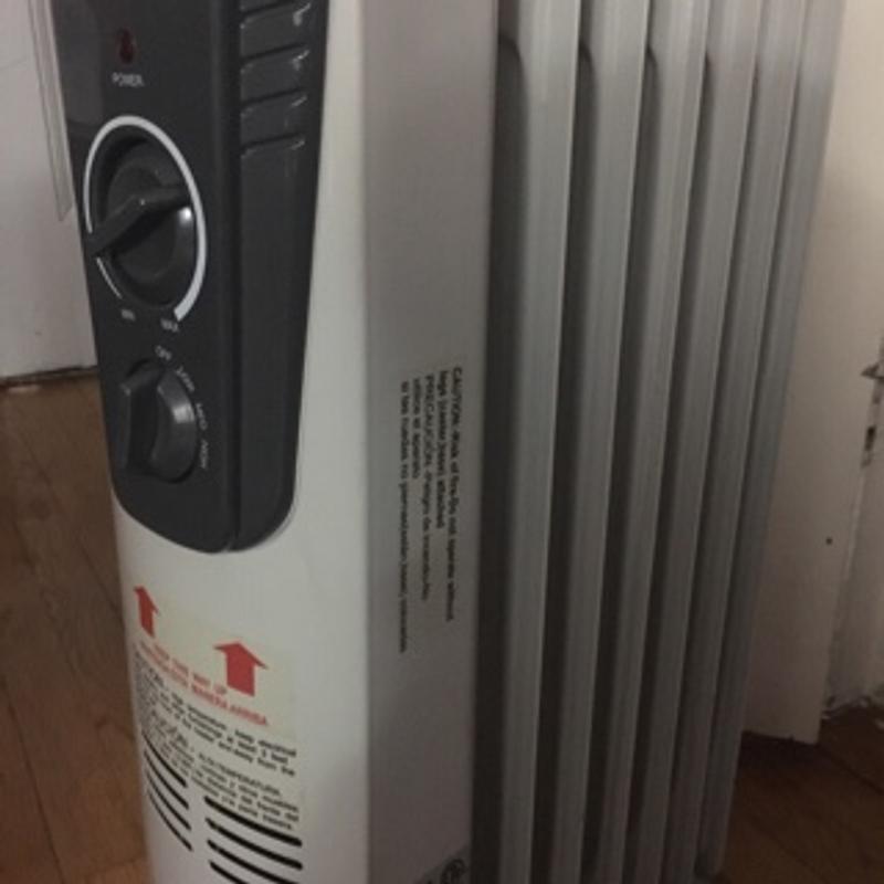 Kenworld electric oil filled heater model CYAA457 for sale in White