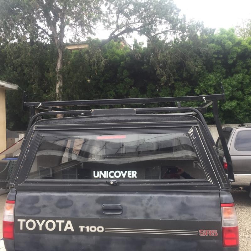 Toyota t100 or tundra camper shell and lumber rack for sale in Los