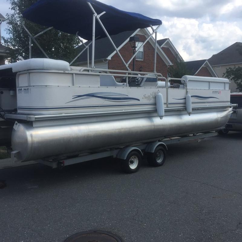 2003 Smoker Craft pontoon boat with trailer . Boat needs a engine being