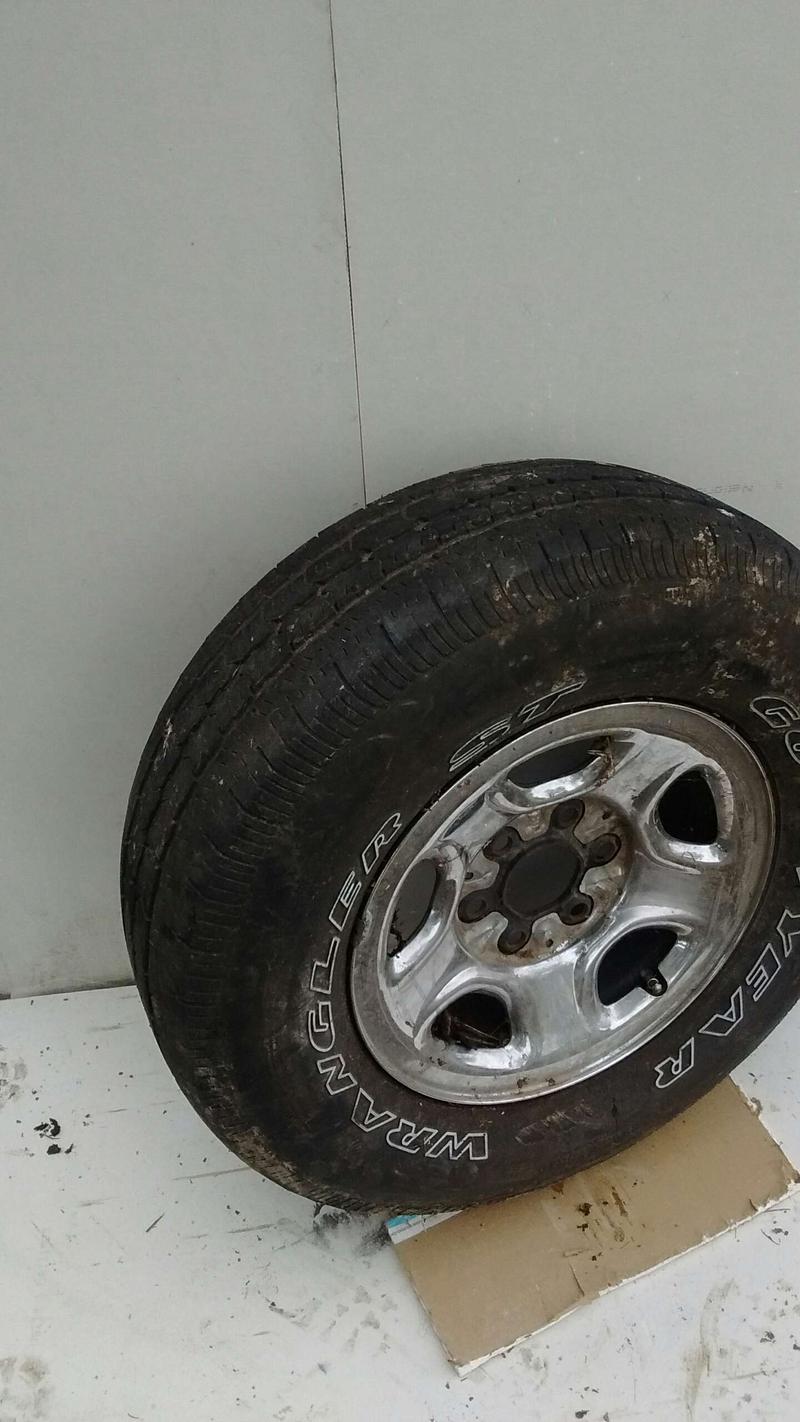 16" 5 hole Dodge rim and tire for sale in Mountain Grove, MO 5miles Buy and Sell