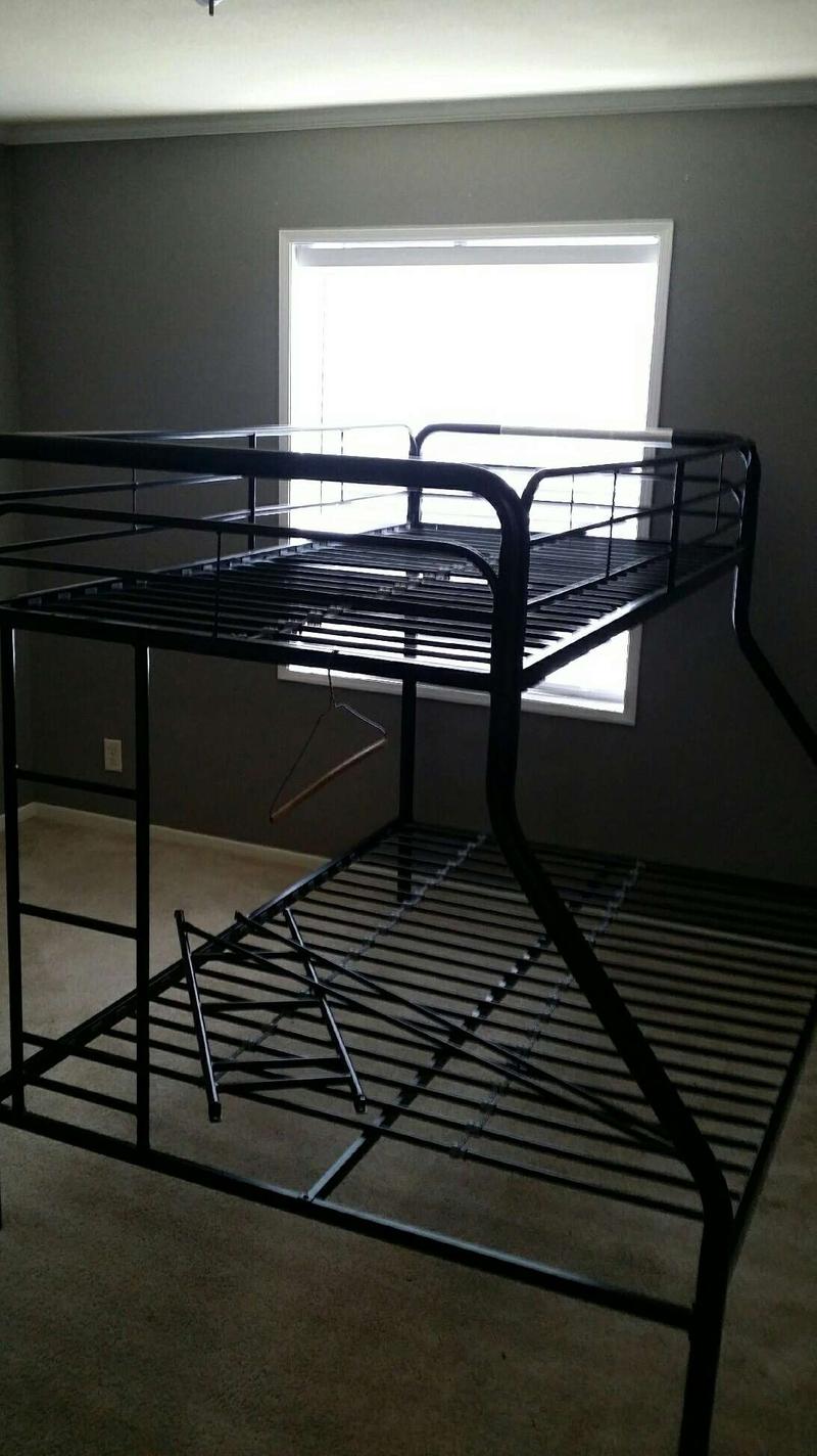 Metal bunk bed top twin/bottom full frame for sale in Tomball, TX