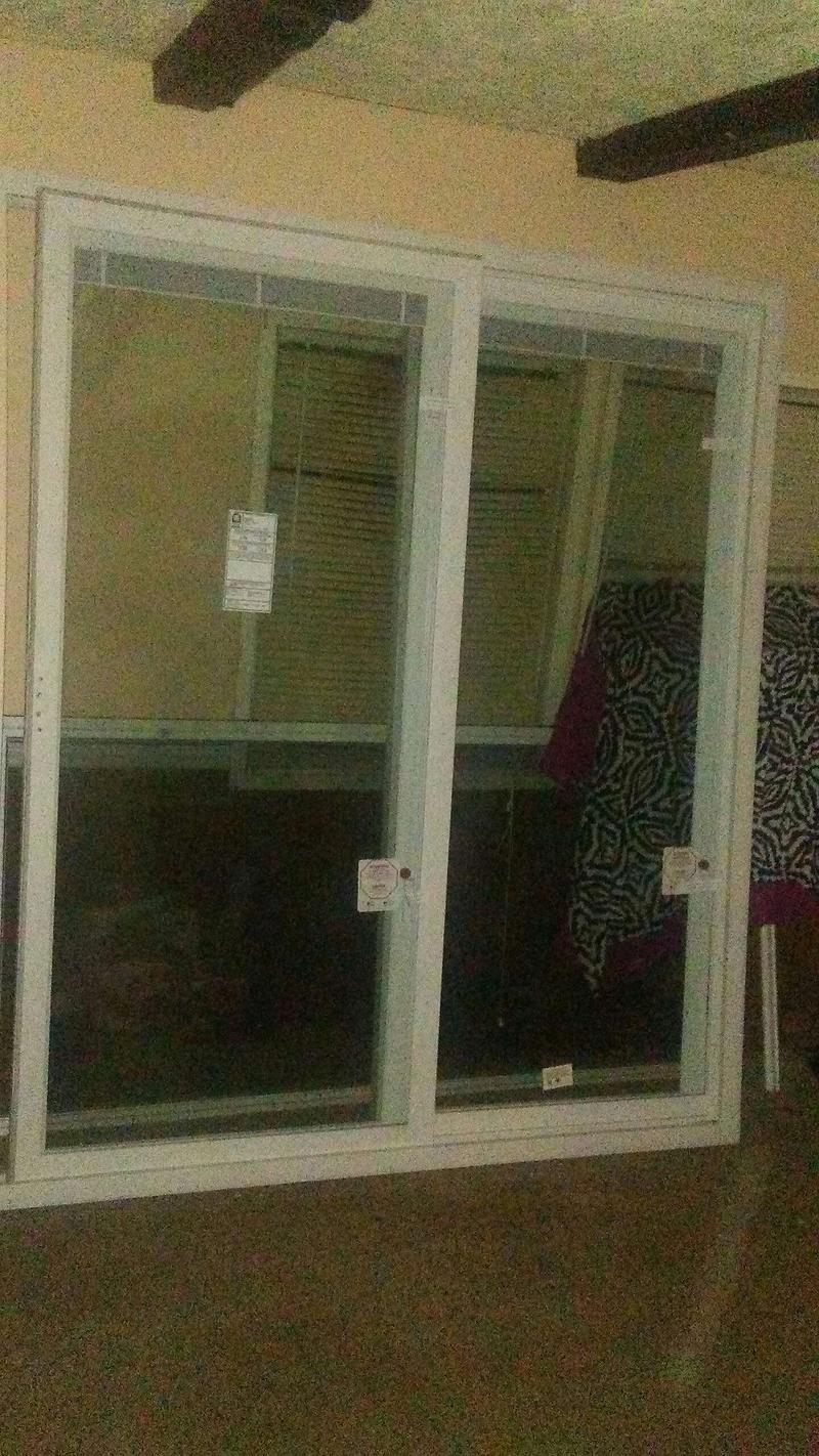 Brand new double pane sliding glass door with builtin blinds paid 850 for it for sale in