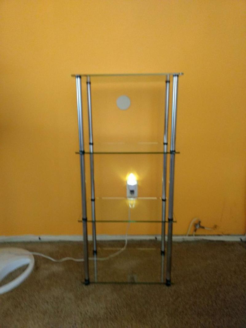 Glass shelf's consist of 4 shelves it's 38 1/2 wide x 17 3/4 long x 12