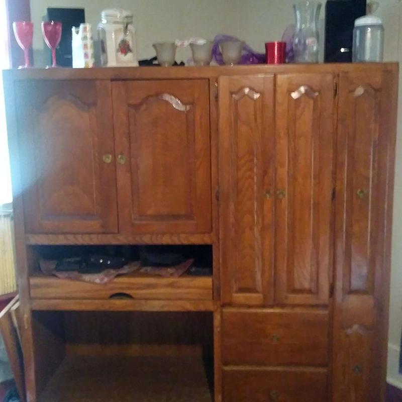 Solid oak entertainment center hidden doors and pull out drawers for