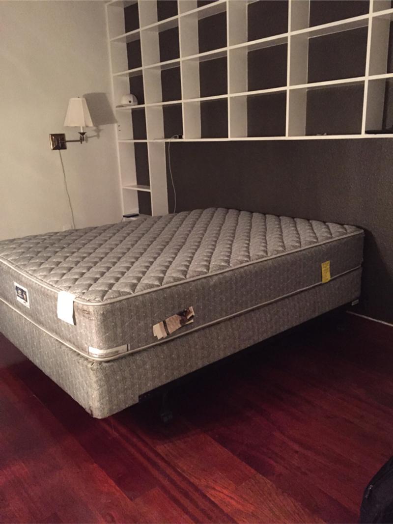 Serta queen size mattress, matching box spring, and frame for sale in
