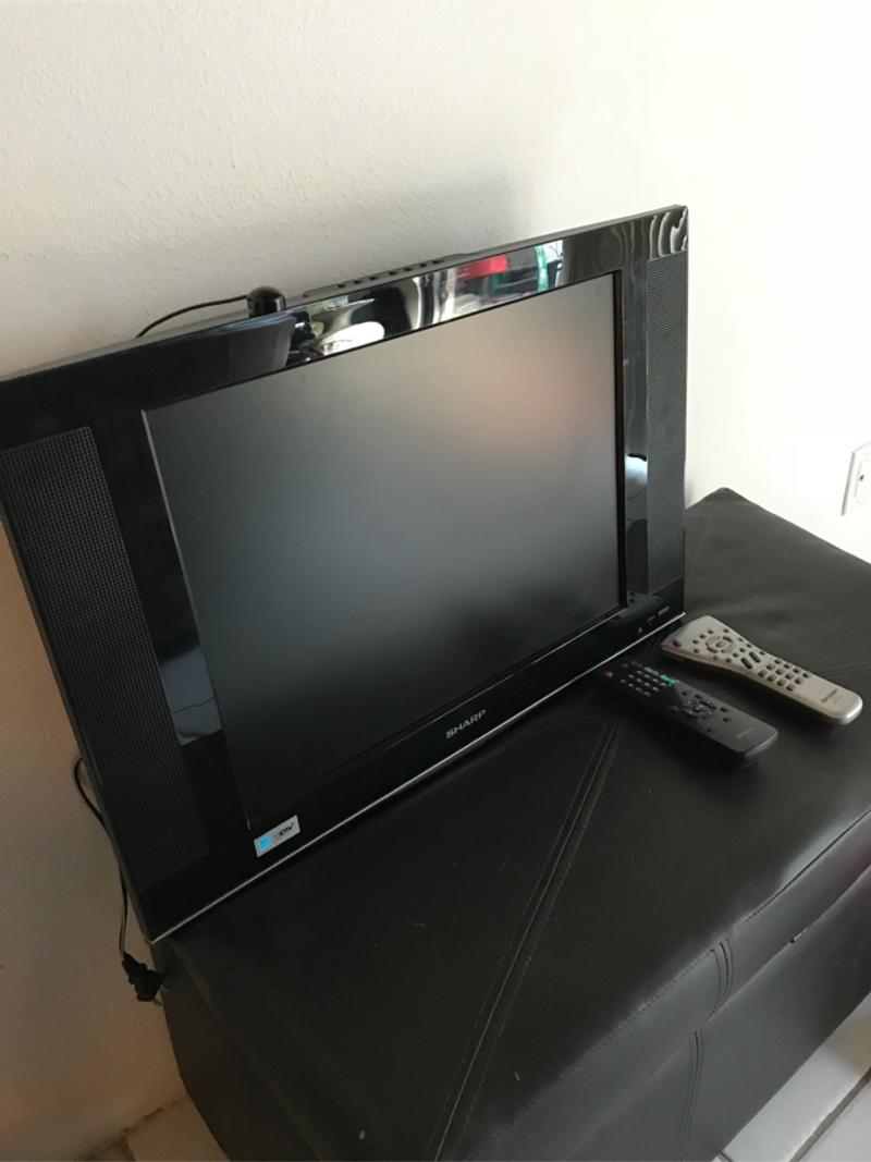 Sharp 20" Liquid Crystal Flat Screen TV With Remote ( Excellent Condition) with for sale in