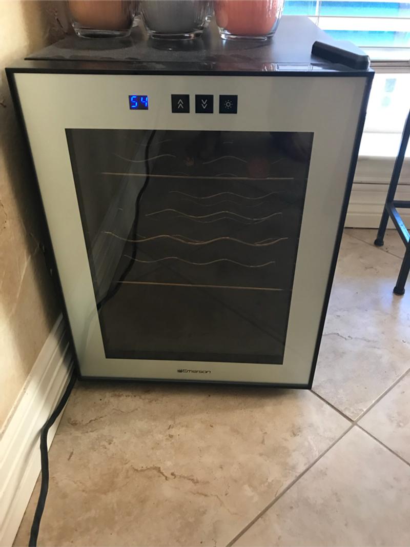 Emerson 9 bottle wine cooler,almost new. Works excellent . for sale in