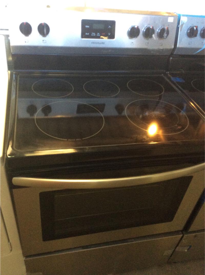 Brand new glass top electric range stainless steel from scratch and