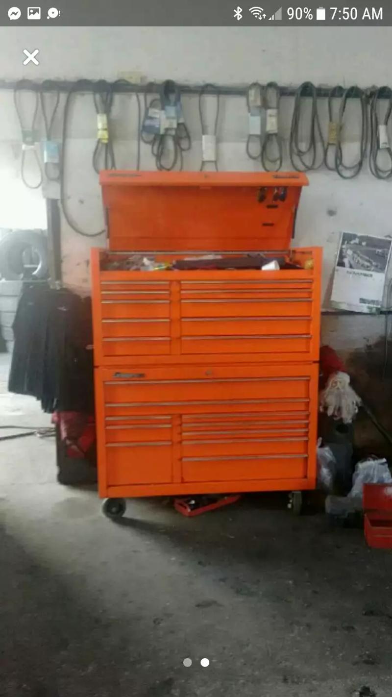 Orange snap on tool box with tools snap on creeper and engine hoist located in s for sale in