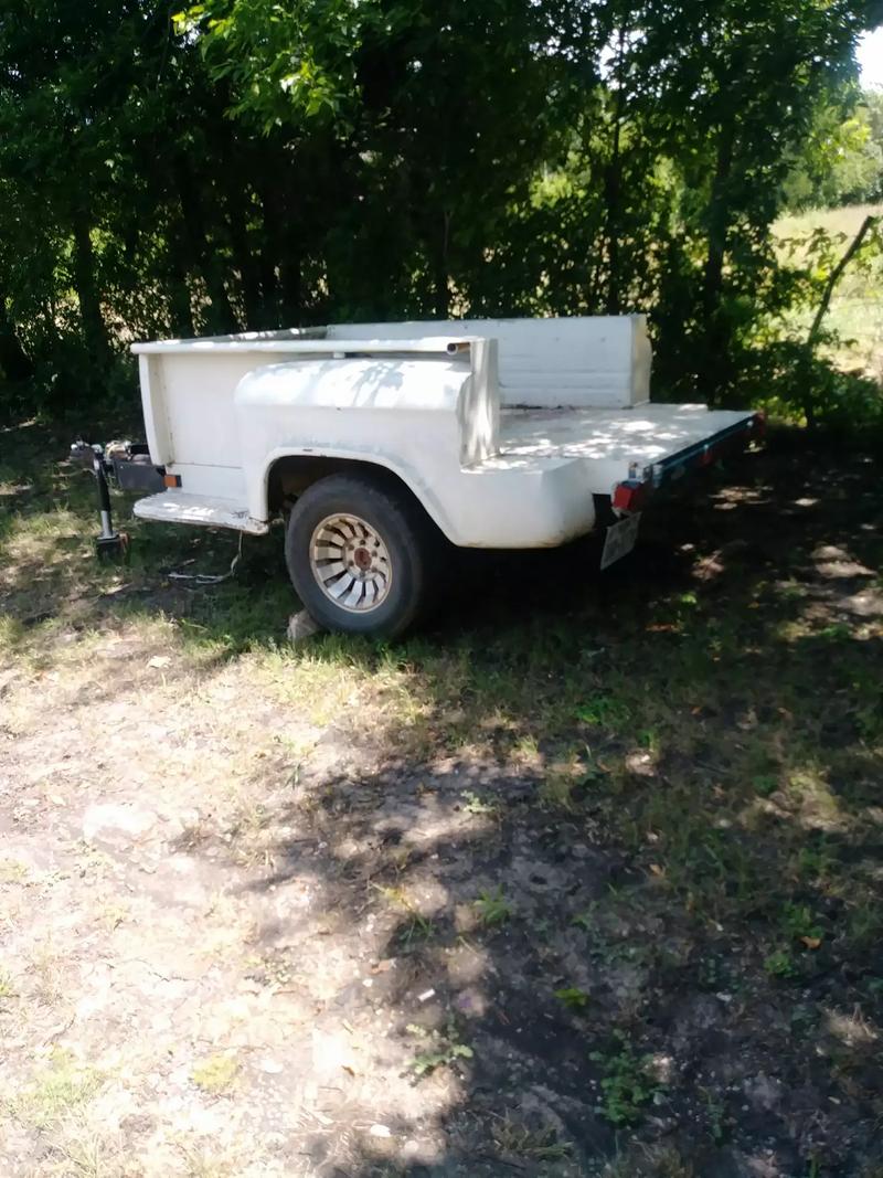 It's a 1965 Chevy truck bed homemade trailer for sale in Farmersville