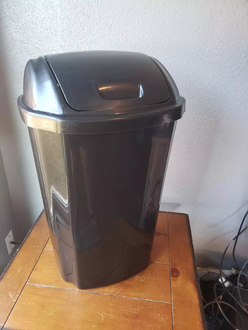 Hefty Swing Lid 13.5 gal. Black Plastic Trash Can for sale in La Porte