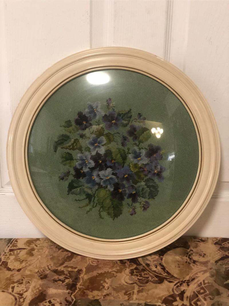 Round Concave Glass Needlepoint of flowers in wood frame. Photos did