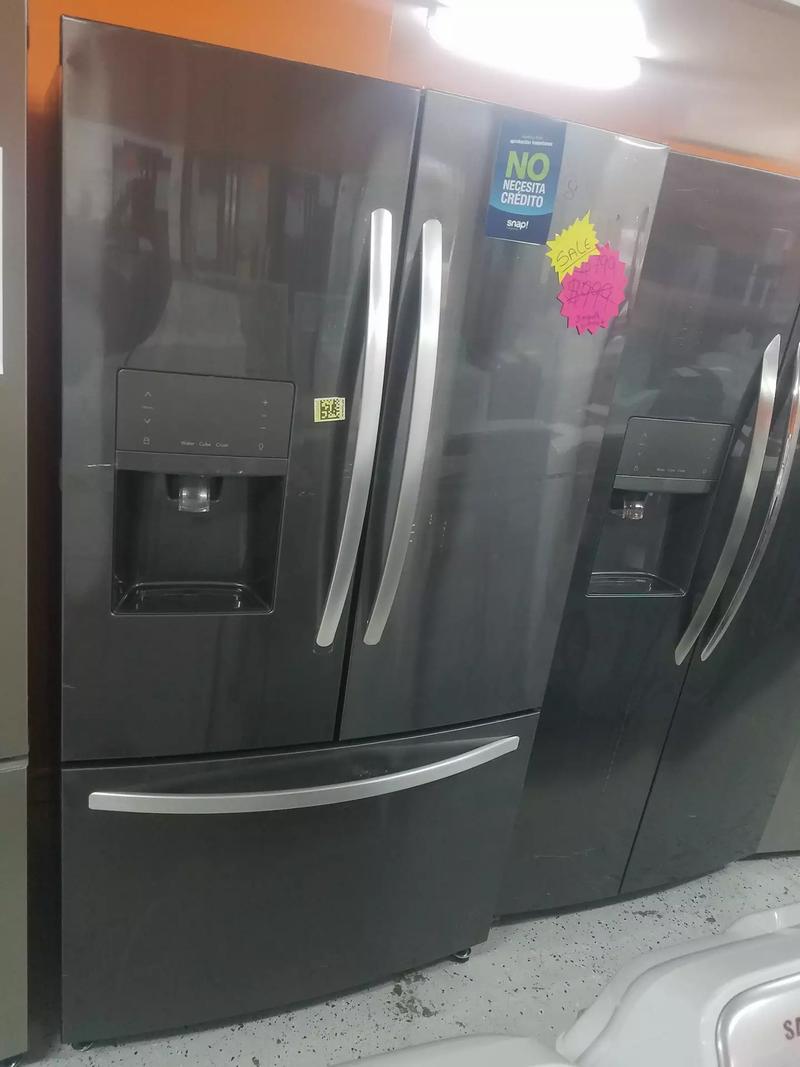 Like new Frigidaire black stainless steel French door refrigerator for