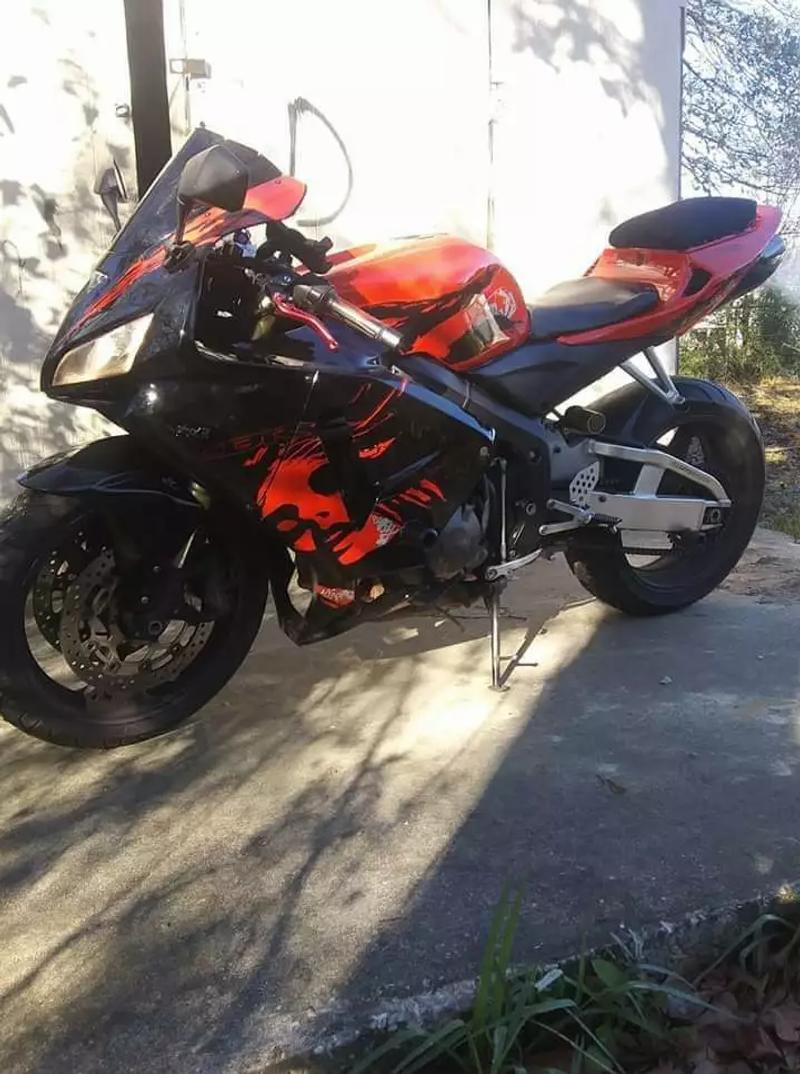 Photo 2006 cbr600rr very good condition never been dropped runs an drives like new well taking care of hate to sell it but time to upgrade to 1000cc