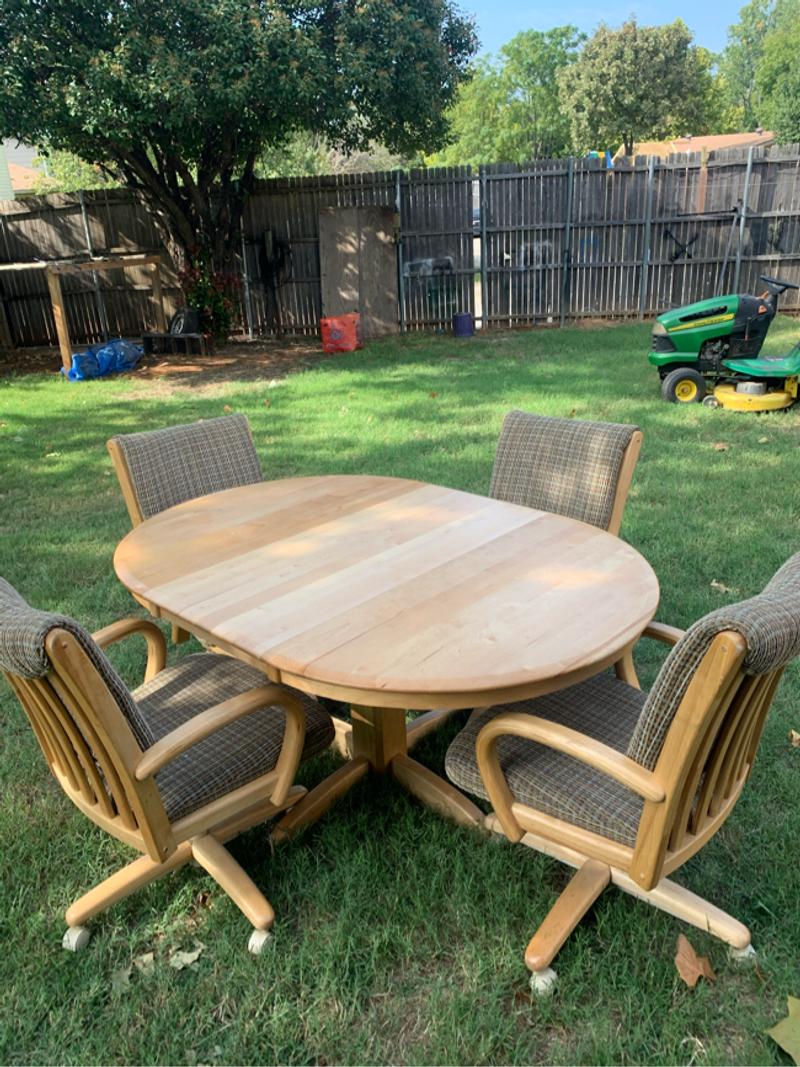 Wooden Dining table With rolling/ swivel chairs for sale in Lake Dallas
