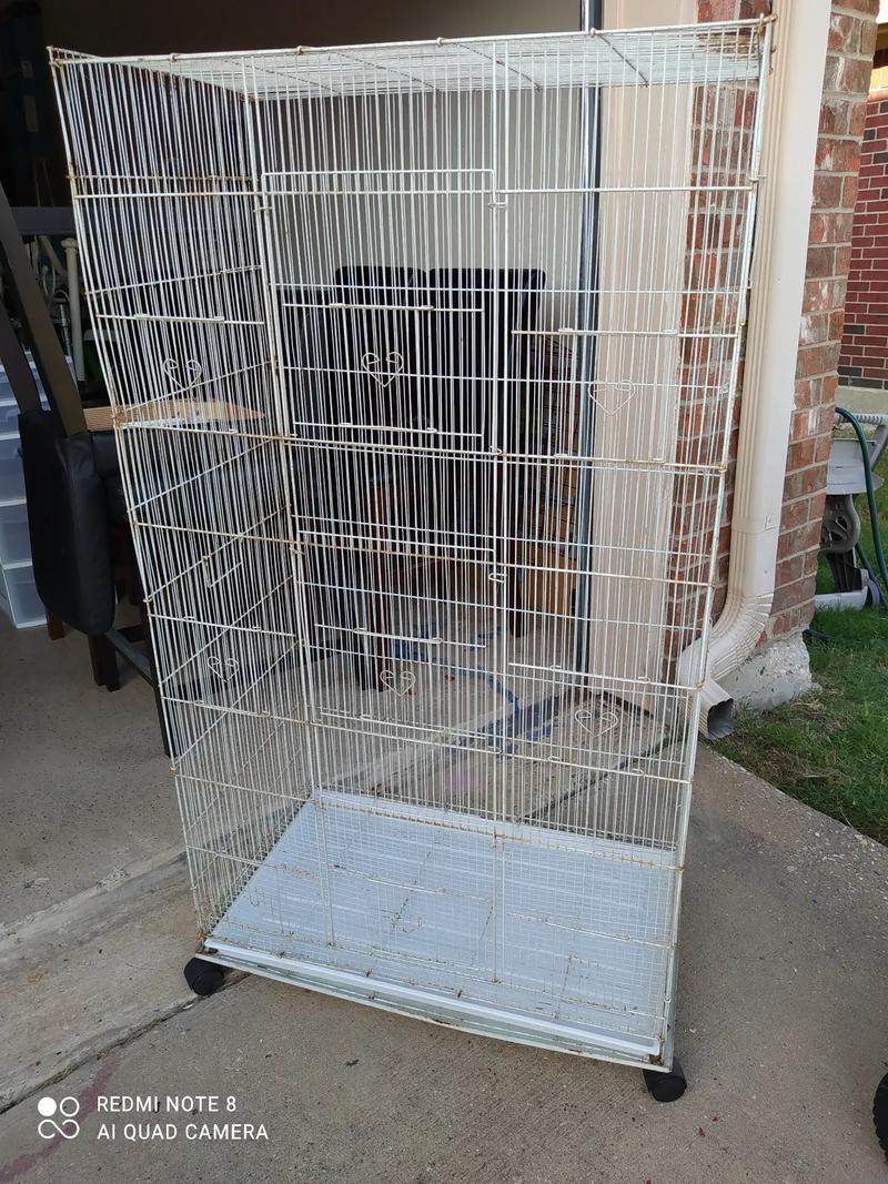 LARGE bird cage 54" Hx30"x17". Wheeled stand. Like new bottom tray