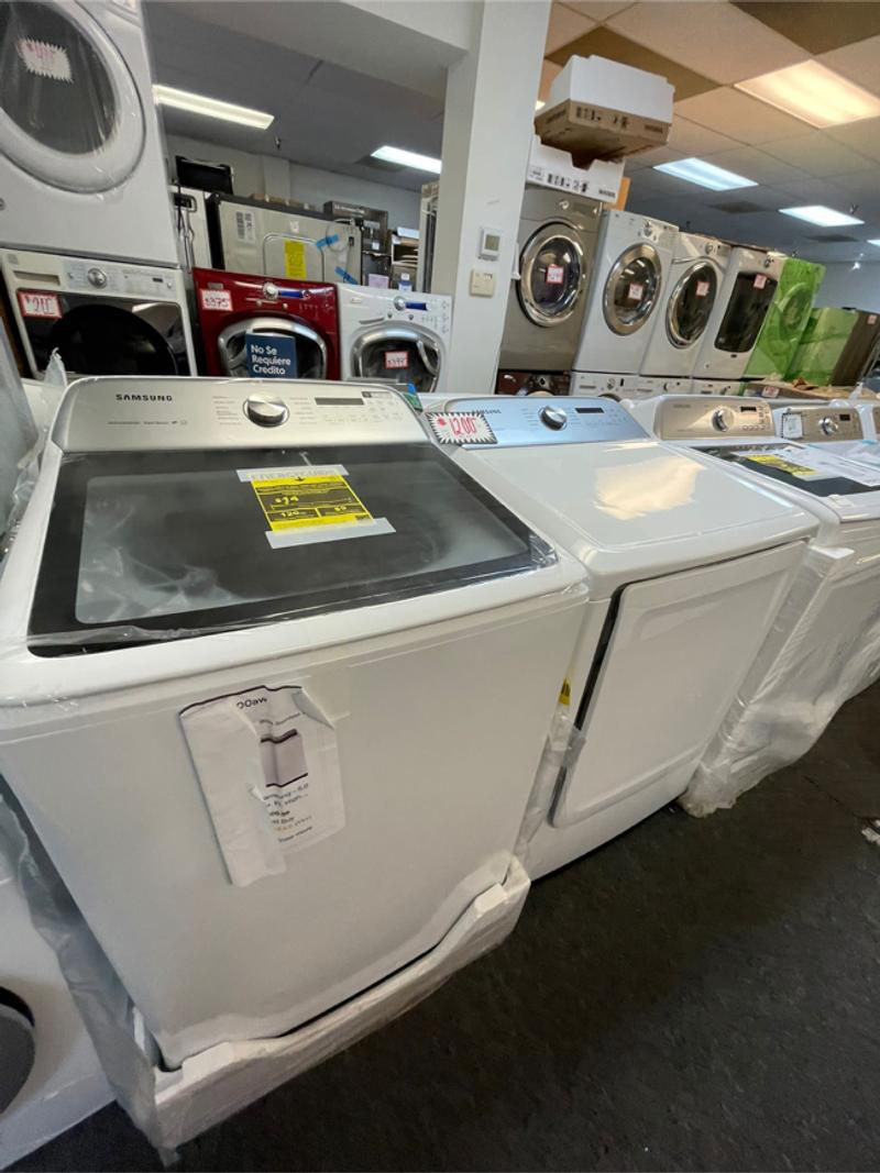 New top load washer & dryer set scratched and dented with warranty for