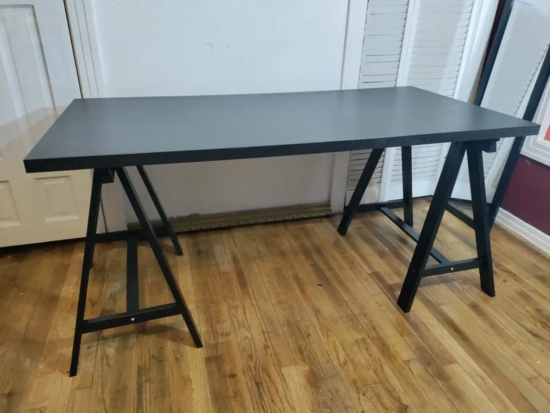 Ikea desk,table.legs are made out of a lightweight wood and the top is
