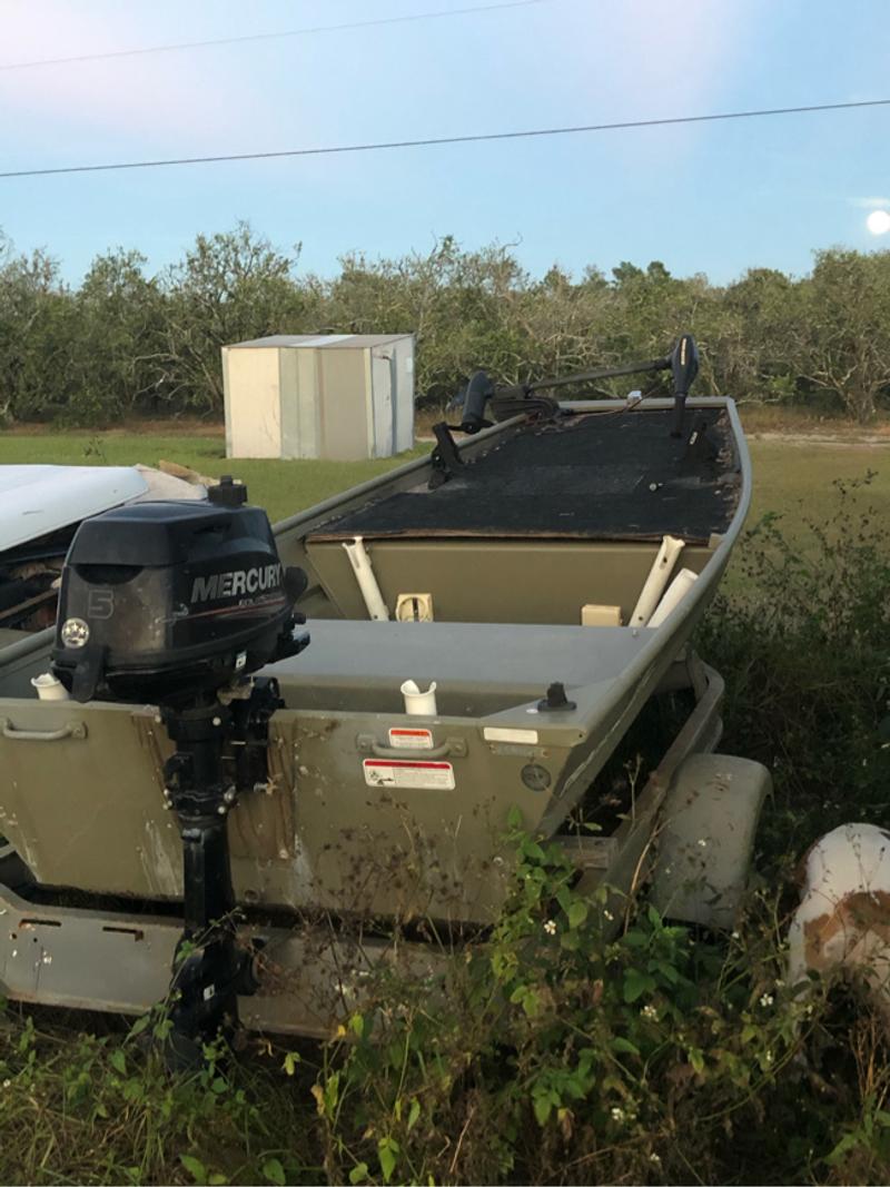 12 ft Jon boat, 5hp 4 stroke Mercury outboard, trolling motor for sale