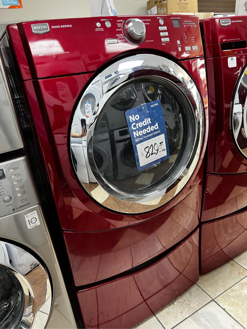 Dark red front loader washer and dryer set with pedestal for sale in
