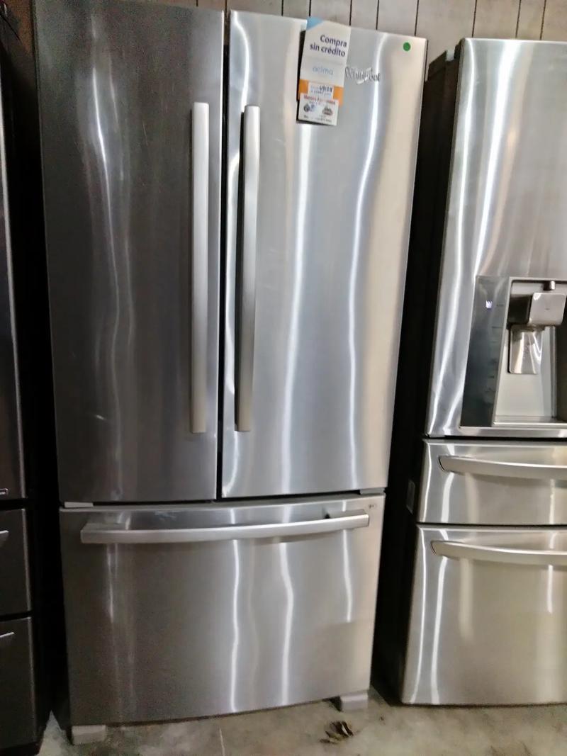 Whirlpool refrigerator French doors stainless steel for sale in Houston
