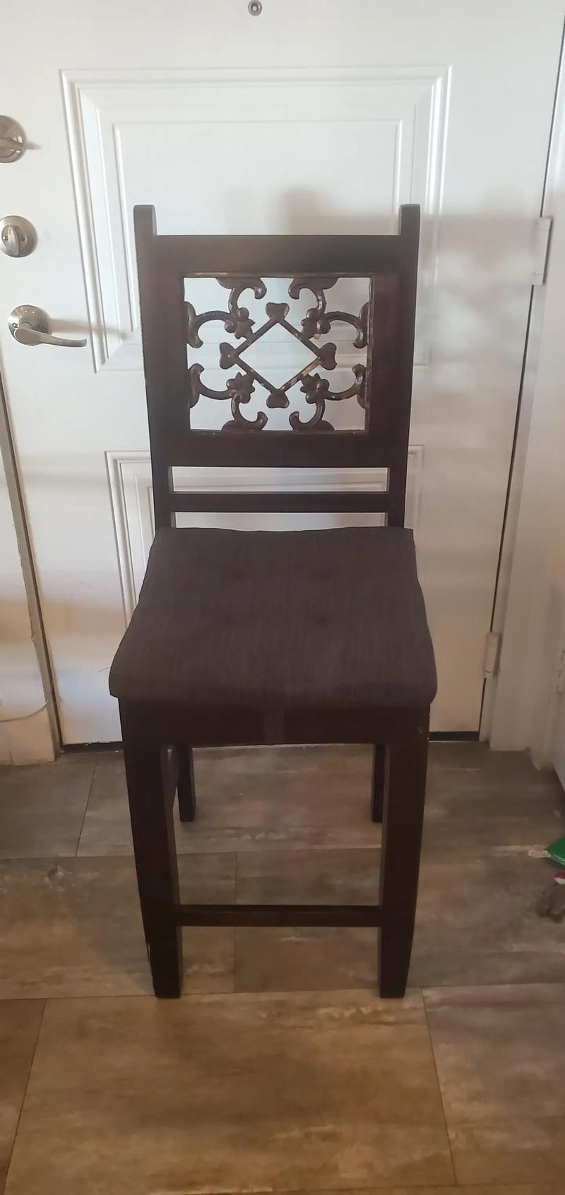 4 Wooden artisitc high top chairs with decorative metal back rest with