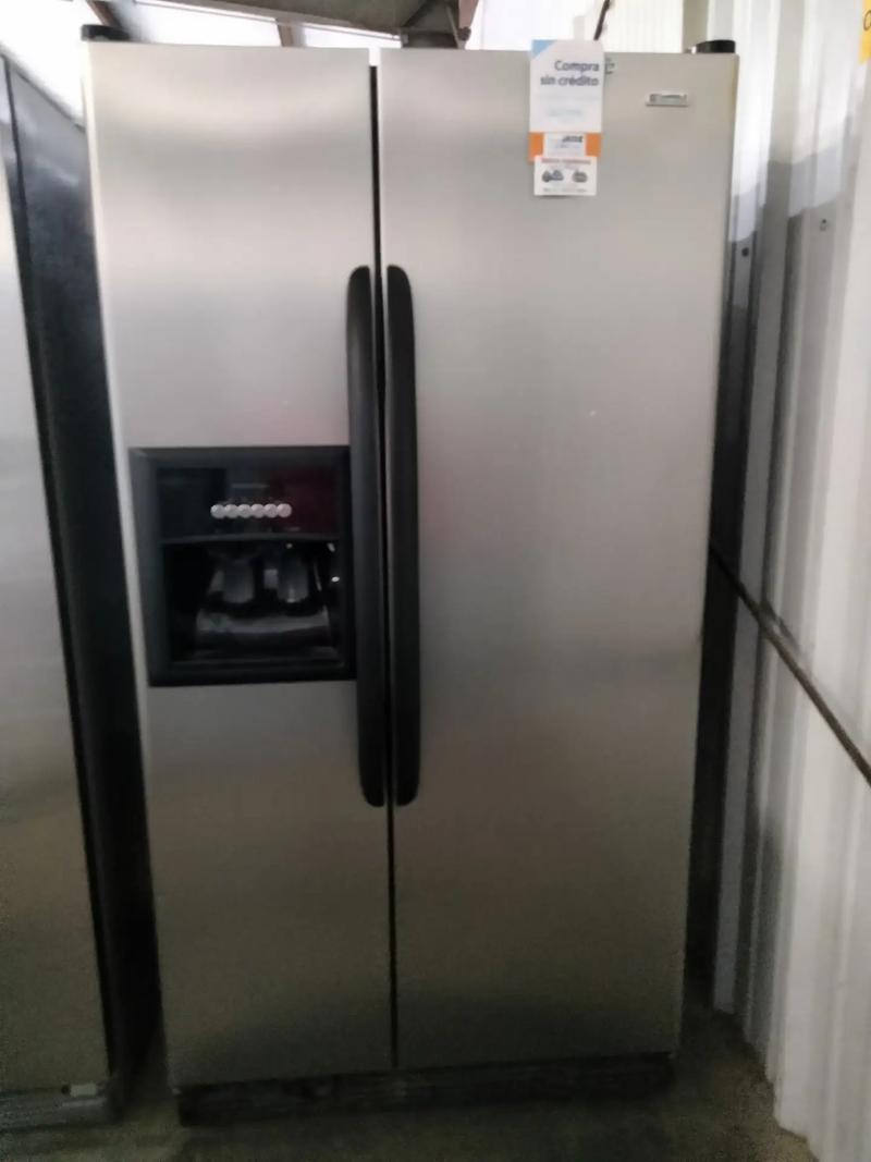 Kenmore refrigerator side by side stainless for sale in Houston, TX