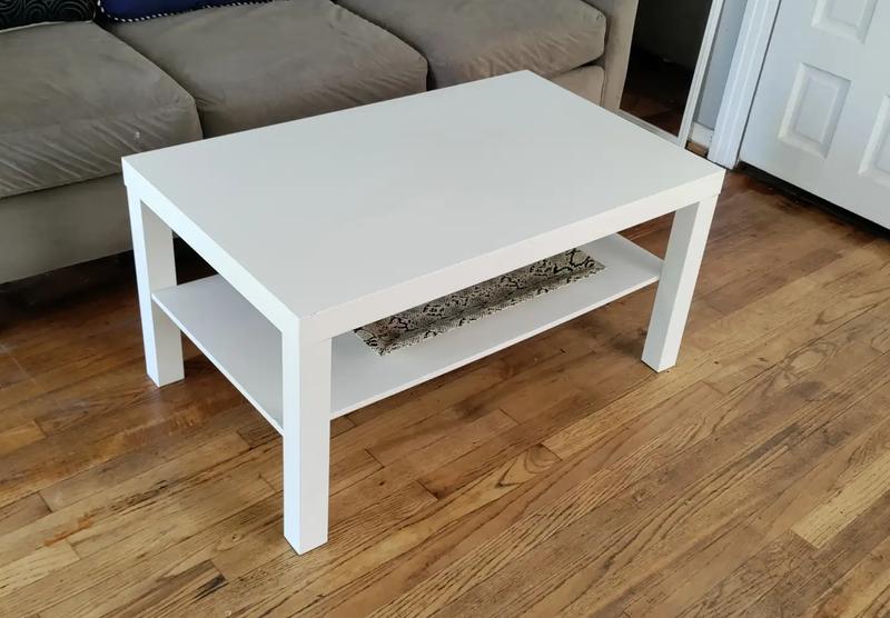 White Ikea coffee tableFew little paint chips in a few placesVery light water Ma for sale in