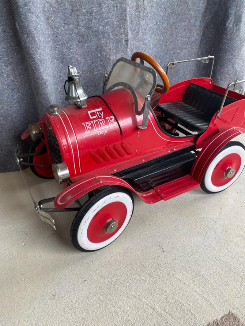 Kalee red pedal car fire truck city fire department. Working pedal car