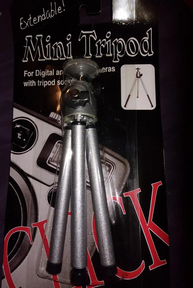 Extendable mini tripod for digital and video cameras with tripod