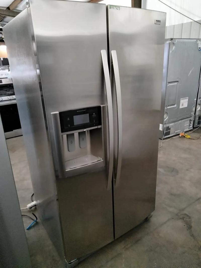 Kenmore refrigerator side by side stainless for sale in Houston, TX