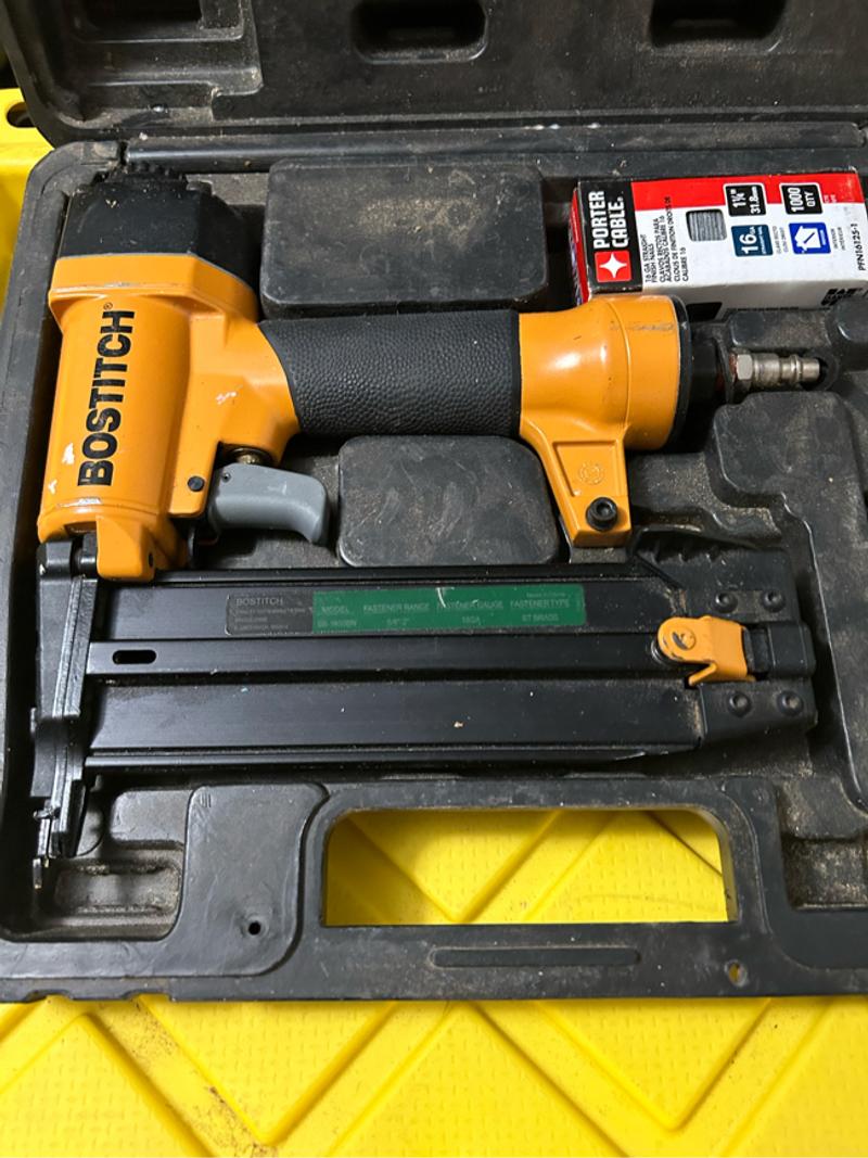 Bostitch finishing nail gun in case takes up to 2 inch nails like new