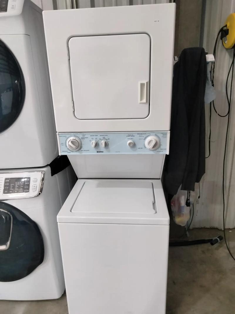 Kenmore washer and dryer stackable electric color white W/24 for sale